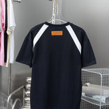 Side profile of Louis Vuitton cotton t-shirt with signature branding