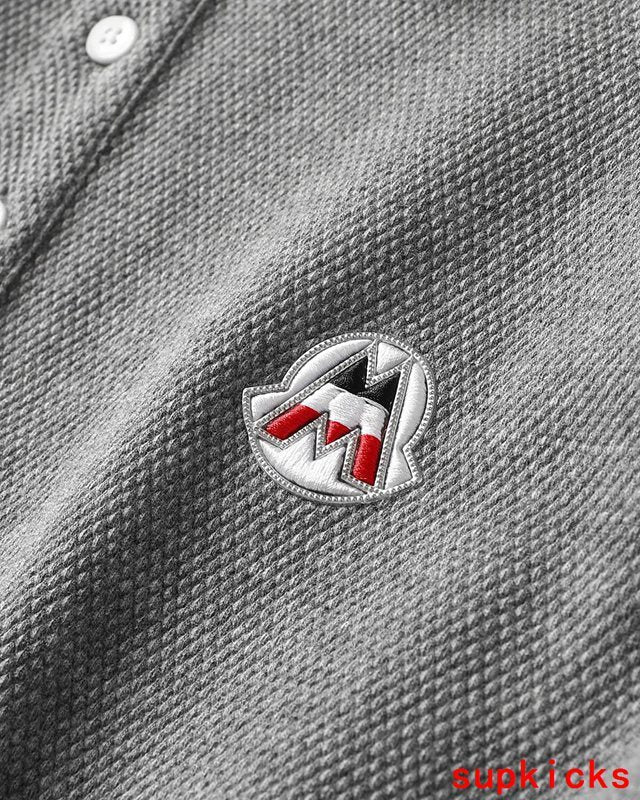 Close-up detail shot of Moncler luxury clothing with contemporary cut