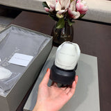 Alexander McQueen classic monochrome luxury sneakers view 4 everyday casual design
