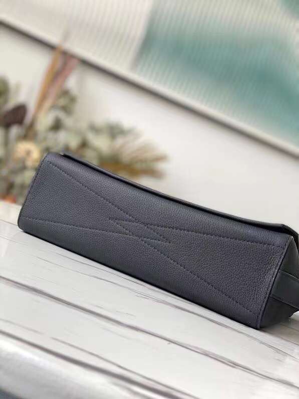 Styled lifestyle shot of sleek chic women's handbag – women's statement bag