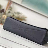 Styled lifestyle shot of sleek chic women's handbag – women's statement bag