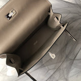 Side view of sleek structured handbag