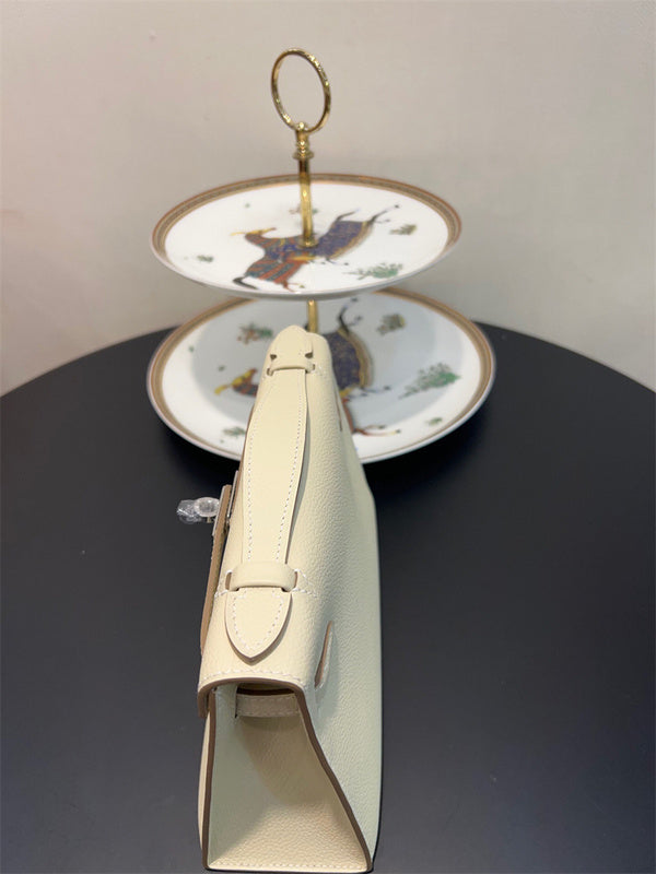 Side view of classic structured handbag