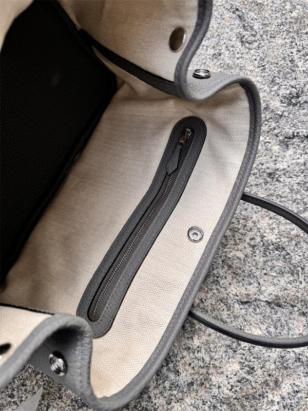 Side view of statement structured handbag