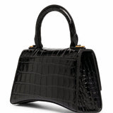 Close-up of Balenciaga handbags hardware and fine stitching