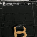 Close-up of Balenciaga handbags hardware and fine stitching