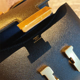  minimalist top-handle bag styled with outfit 12