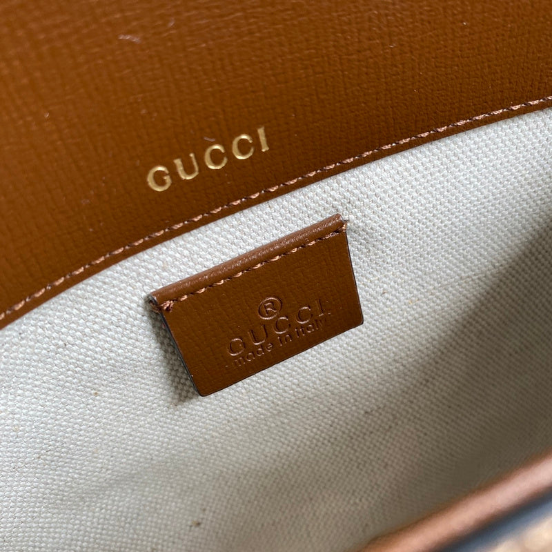 Close-up detail of premium classic women's handbag – women's statement bag