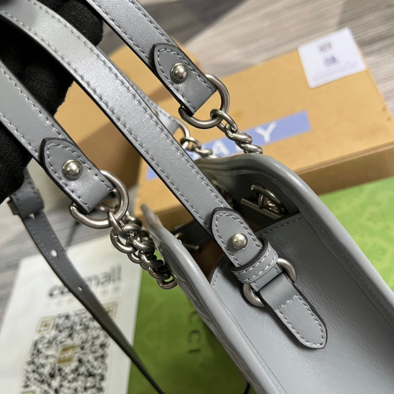 Styled lifestyle shot of signature refined women's handbag – women's premium purse