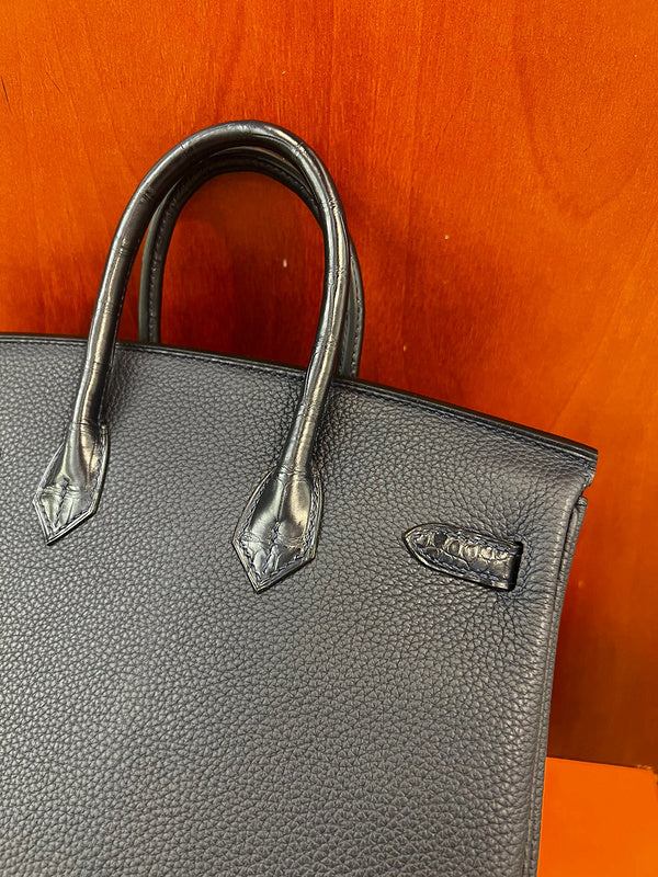 Close-up detail of statement bag design