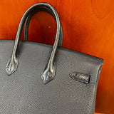 Close-up detail of statement bag design
