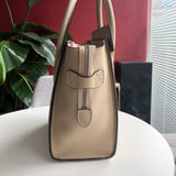 Handle and strap detail of premium classic women's handbag – women's luxury handbag