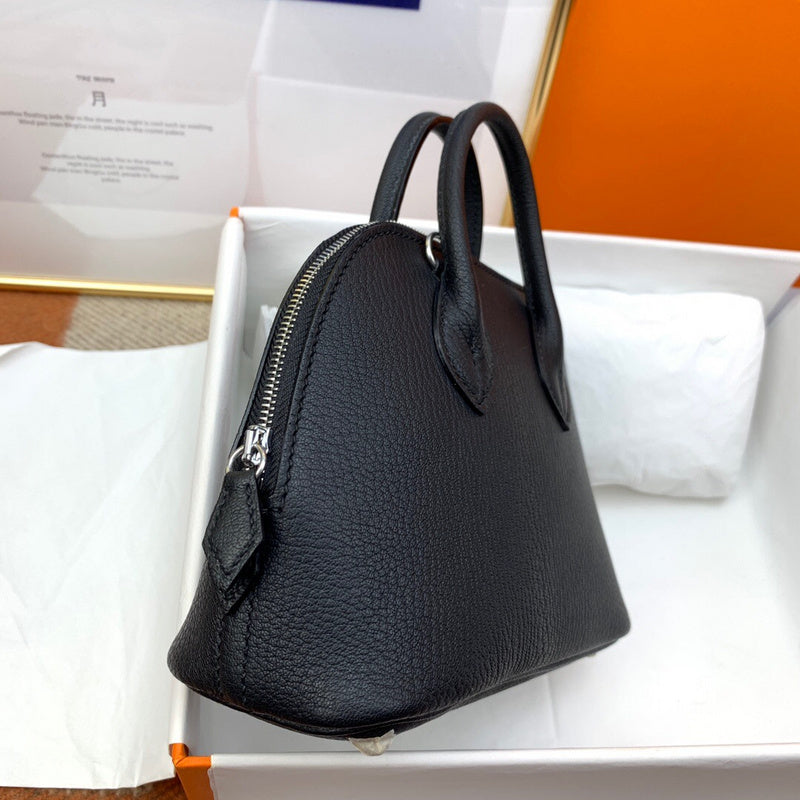 Side view of sophisticated structured handbag