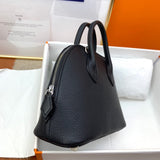Side view of sophisticated structured handbag