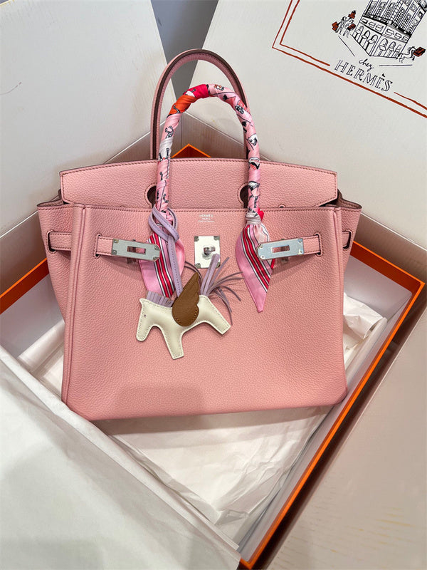  Streamlined shopper bag carried on shoulder 10