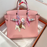  Streamlined shopper bag carried on shoulder 10
