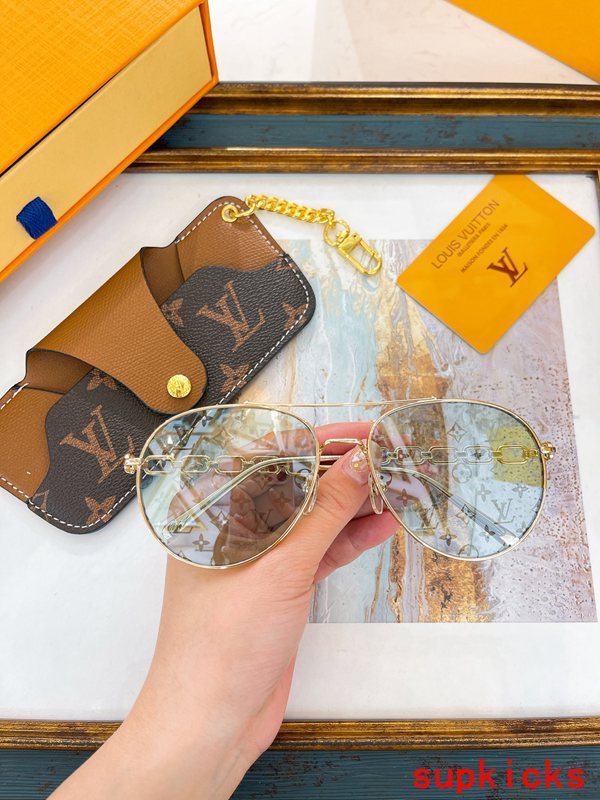 Close-up detail view of Louis Vuitton unisex sunglasses