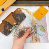 Close-up detail view of Louis Vuitton unisex sunglasses