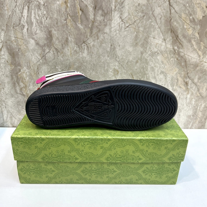 Side profile of Gucci fresh white-and-black sneakers sleek tonal finish