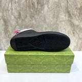 Side profile of Gucci fresh white-and-black sneakers sleek tonal finish