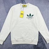 Back view of Gucci luxury clothing with signature branding