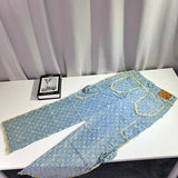 Flat lay presentation of Louis Vuitton luxury clothing with relaxed-fit cut