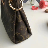 Close-up detail of signature everyday-luxe women's handbag – women's statement bag