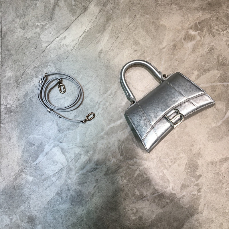 Understated Vegan Leather Handbag - Statement Silhouette | Women's Everyday Carry Handbag #613 - side angle view (image 2) of designer-inspired handbag