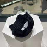 Close-up detail view of Burberry unisex cap