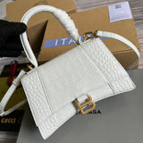 Front view of classic structured women's handbag – women's designer-style accessory