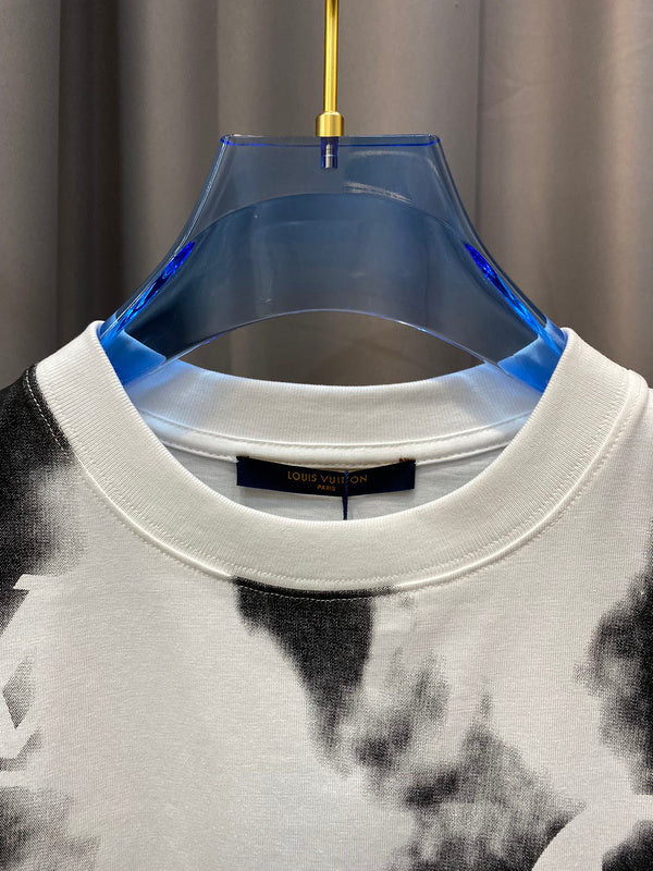 Flat lay presentation of Louis Vuitton cotton t-shirt with signature branding