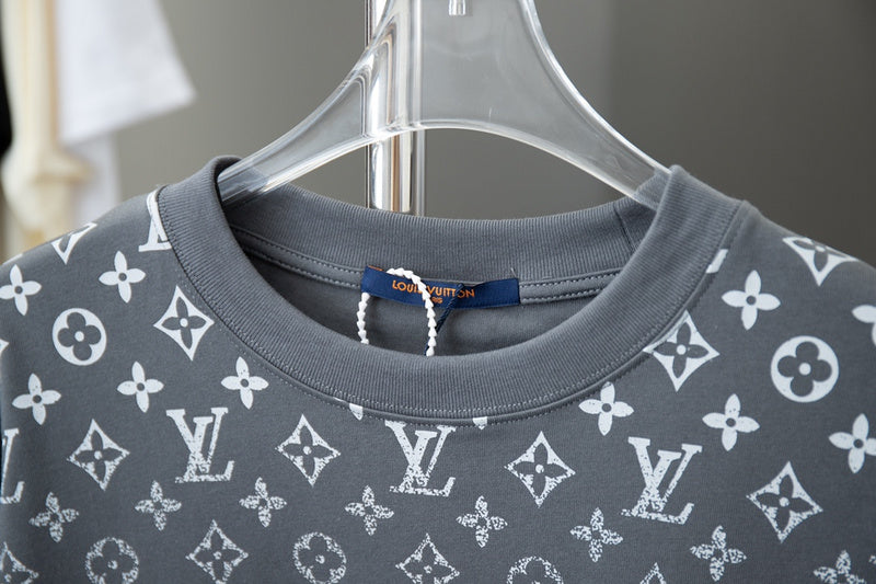 Close-up detail shot of Louis Vuitton cotton t-shirt with signature branding
