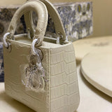 Styled lifestyle shot of everyday-luxe structured women's handbag – women's everyday handbag
