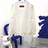 Back view of Louis Vuitton luxury clothing with runway-inspired design