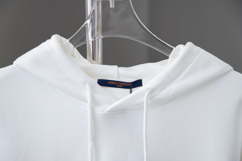 Close-up detail shot of Louis Vuitton luxury clothing with relaxed-fit cut