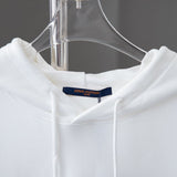 Close-up detail shot of Louis Vuitton luxury clothing with relaxed-fit cut