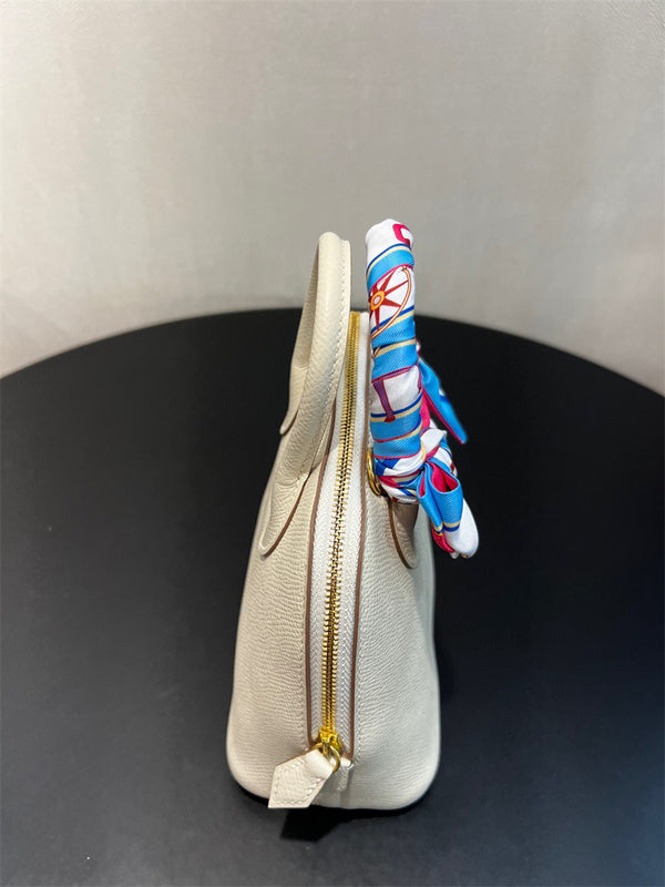  tailored top-handle bag detail view showing craftsmanship 8