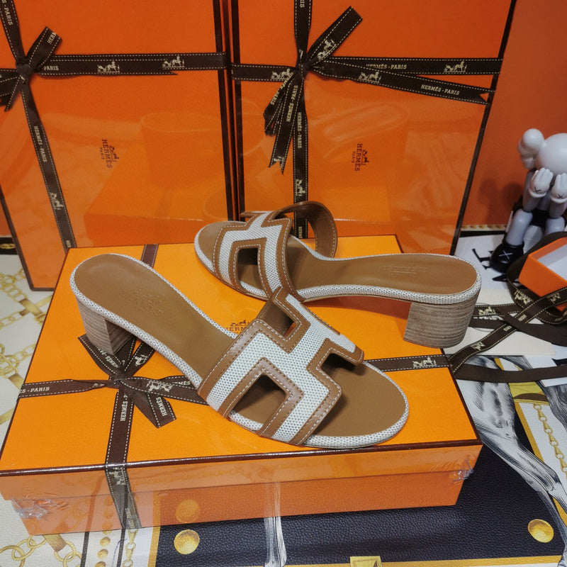 Hermès White Slide Sandals - Heel Detail View