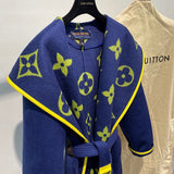 Flat lay presentation of Louis Vuitton luxury clothing with contemporary cut