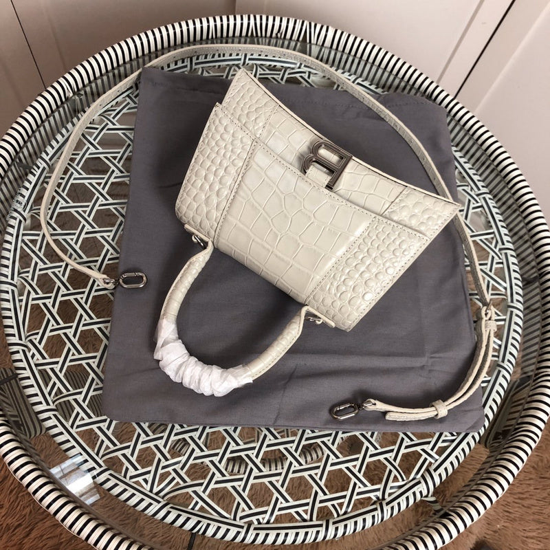Styled lifestyle shot of modern polished women's handbag – women's designer-style accessory