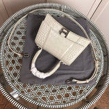 Styled lifestyle shot of modern polished women's handbag – women's designer-style accessory