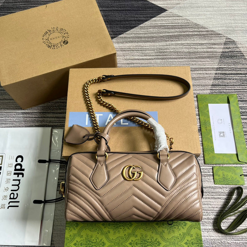 Side profile of elevated signature women's handbag – women's luxury handbag