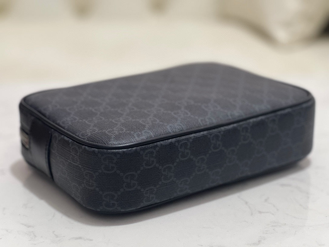 Interior view of Gucci Pouch with organised compartments
