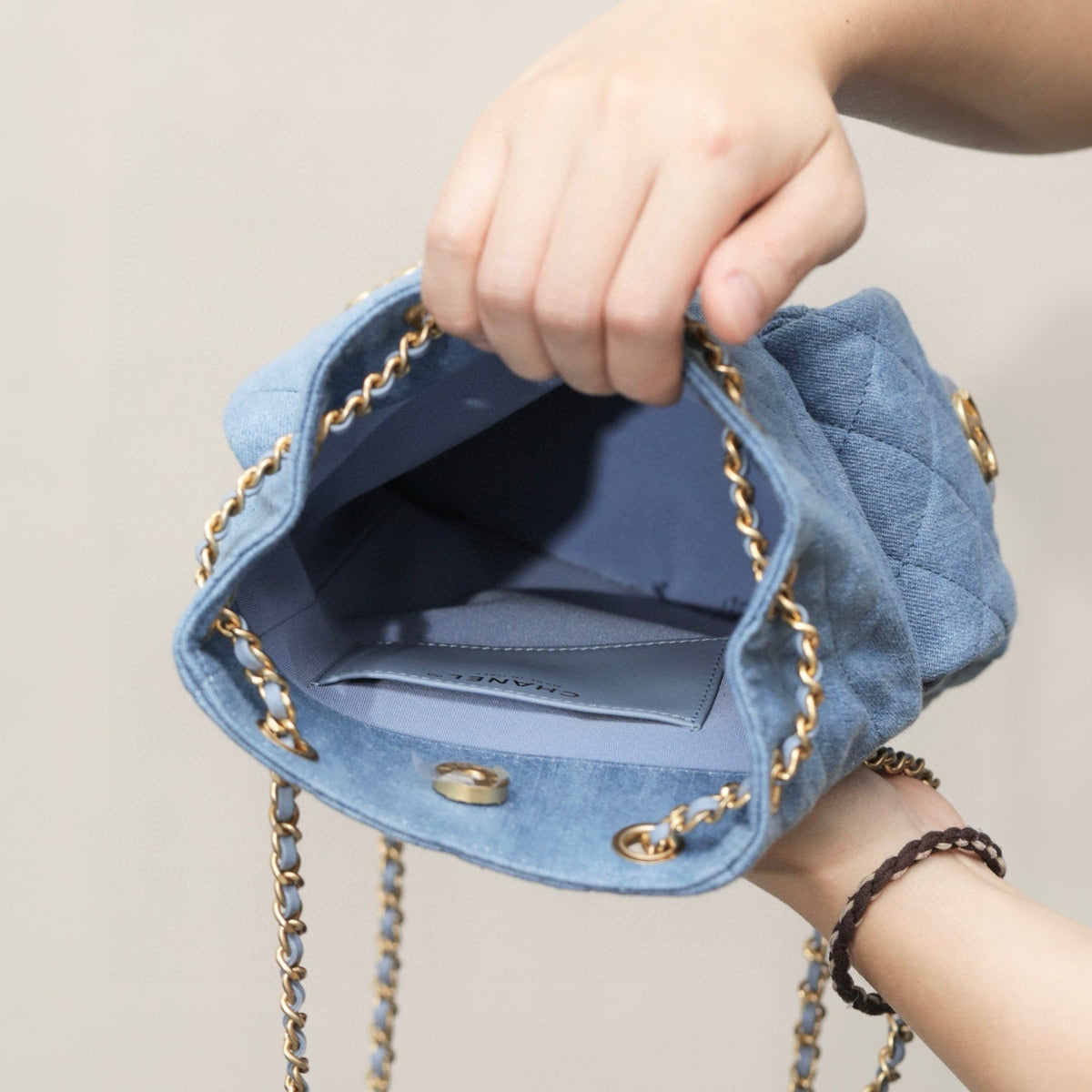 Chanel 25 Denim Backpack detail shot – authentic designer craftsmanship