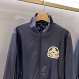 Full styled look of Louis Vuitton luxury clothing with signature branding