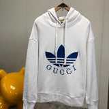Back view of Gucci luxury clothing with label-forward styling