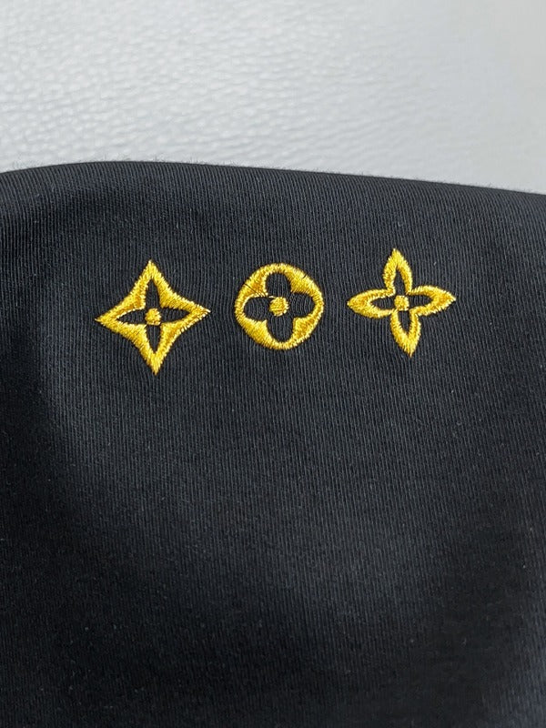 Front view of Louis Vuitton luxury clothing with everyday silhouette