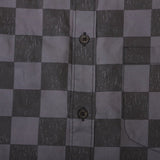 Flat lay presentation of Louis Vuitton luxury clothing with relaxed-fit cut