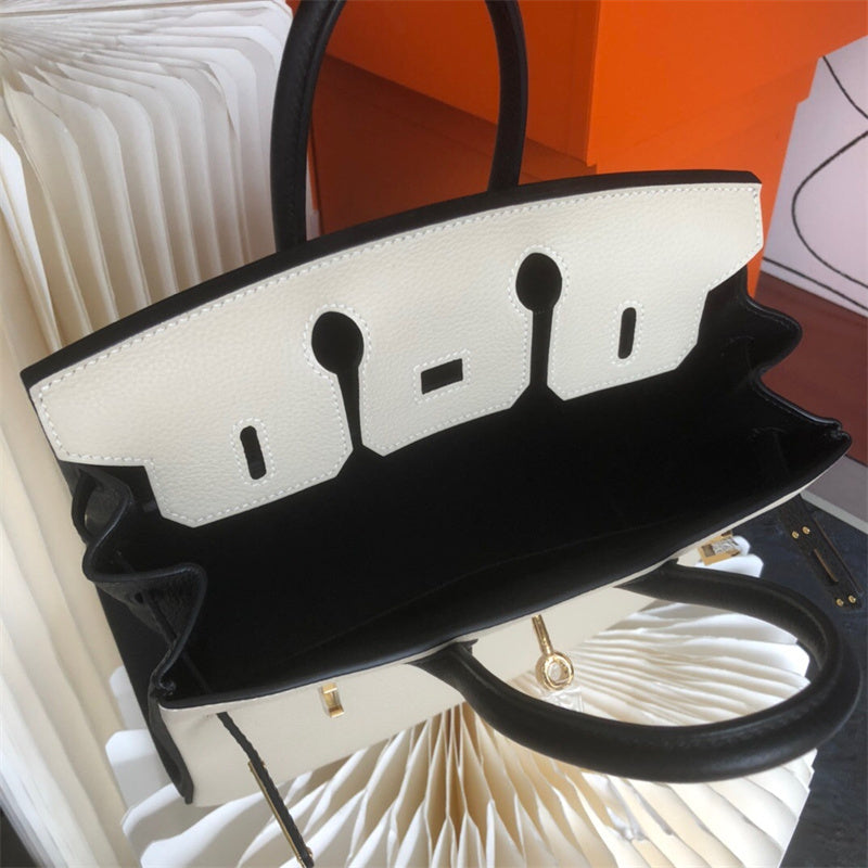 Side view of fluid structured handbag