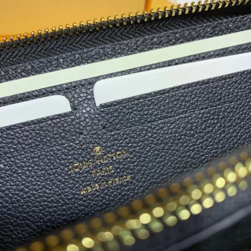 Side profile of structured elevated women's handbag – women's luxury accessory